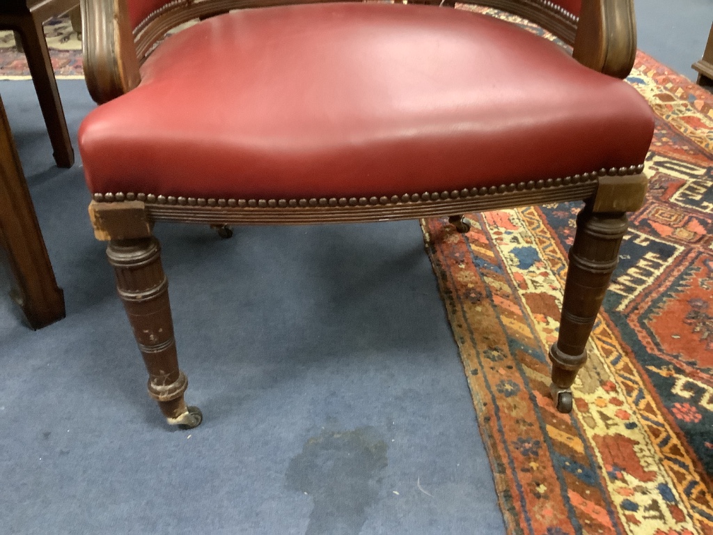 A late Victorian mahogany tub framed library chair, width 62cm, depth 80cm, height 90cm